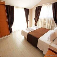 Diana Suite Hotel комната для гостей