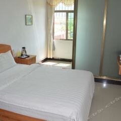 Zhengfei Hostel комната для гостей