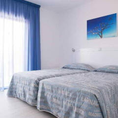 Liquid Hotel Apartments комната для гостей