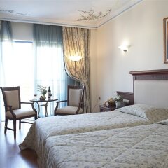 Отель Atrium Palace Thalasso Spa Resort & Villas Греция, Калафос - 5 отзывов об отеле, цены и фото номеров - забронировать отель Atrium Palace Thalasso Spa Resort & Villas онлайн комната для гостей
