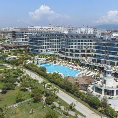 Commodore Elite Suites & Spa Ultra All Inclusive Турция, Сиде - отзывы, цены и фото номеров - забронировать отель Commodore Elite Suites & Spa Ultra All Inclusive онлайн пляж