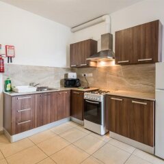 Отель Seashells Self Catering Apartment Мальта, Буджибба - отзывы, цены и фото номеров - забронировать отель Seashells Self Catering Apartment онлайн