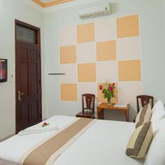 Отель Tra Que Flower Homestay Вьетнам, Хойан - отзывы, цены и фото номеров - забронировать отель Tra Que Flower Homestay онлайн комната для гостей фото 3