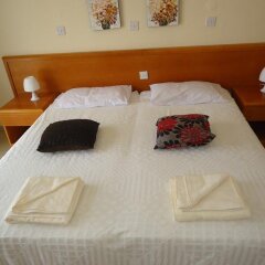 Marisa Hotel Apartments сейф в номере