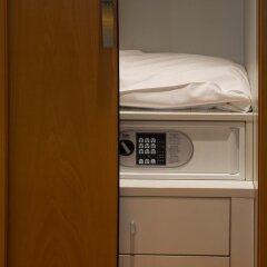 Hotel Planet Ареццо сейф в номере