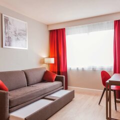 Отель Aparthotel Adagio Genève Saint Genis Pouilly Франция, Туари - отзывы, цены и фото номеров - забронировать отель Aparthotel Adagio Genève Saint Genis Pouilly онлайн комната для гостей фото 4