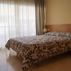 Отель Apartaments Costamar Испания, Калафель - 1 отзыв об отеле, цены и фото номеров - забронировать отель Apartaments Costamar онлайн комната для гостей фото 5