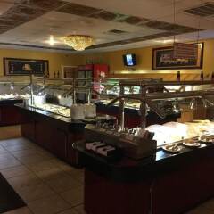 Отель Dragon Inn & Suites питание