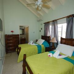 Отель Arawak By The Sea, Silver Sands Jamaica Villas 4BR комната для гостей фото 3