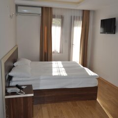 Merkez Otel Турция, Измир - отзывы, цены и фото номеров - забронировать отель Merkez Otel онлайн комната для гостей