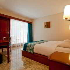 Отель White Rose Kuta Resort, Villas & Spa комната для гостей фото 4