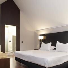 Отель AC Hotel Ciudad de Sevilla by Marriott Испания, Севилья - отзывы, цены и фото номеров - забронировать отель AC Hotel Ciudad de Sevilla by Marriott онлайн комната для гостей фото 2