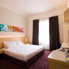 Отель Prescott Hotel KL Medan Tuanku Малайзия, Куала-Лумпур - 1 отзыв об отеле, цены и фото номеров - забронировать отель Prescott Hotel KL Medan Tuanku онлайн комната для гостей фото 4