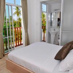 Отель Airport Comfort Inn Maldives Мале комната для гостей фото 2