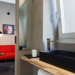 Отель CinqueSuites Ortigia Сиракуза сейф в номере