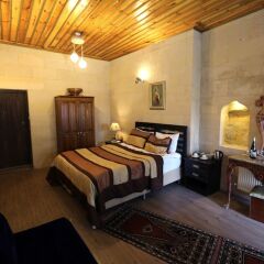 Отель Antik Cave House сейф в номере