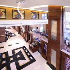 Отель Al Hamra Palace By Warwick интерьер отеля