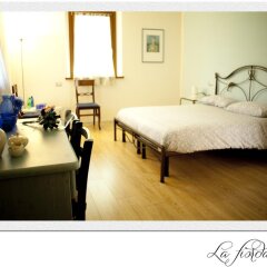 Отель B&B Al Sole Di Cavessago Беллуно сейф в номере