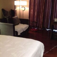 Yiside Poly Zhonghui Plaza Hotel комната для гостей