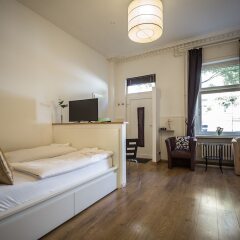 Отель Traumberg Flats Германия, Берлин - отзывы, цены и фото номеров - забронировать отель Traumberg Flats онлайн комната для гостей фото 4