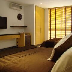 Отель OfiHotel Versalles Cali Колумбия, Кали - отзывы, цены и фото номеров - забронировать отель OfiHotel Versalles Cali онлайн комната для гостей
