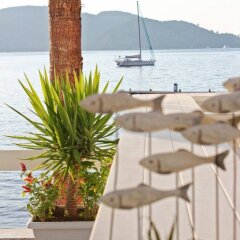 Poseidon Boutique Hotel & Yacht Club пляж фото 2