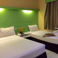 Отель Cebu R Hotel - Capitol Филиппины, Лапу-Лапу - отзывы, цены и фото номеров - забронировать отель Cebu R Hotel - Capitol онлайн комната для гостей фото 5