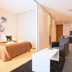 Апартаменты Plaza España Apartments Барселона комната для гостей фото 4
