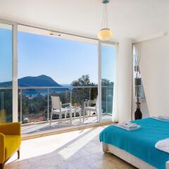 Villa Tizia by Akdenizvillam Турция, Калкан - отзывы, цены и фото номеров - забронировать отель Villa Tizia by Akdenizvillam онлайн комната для гостей фото 4