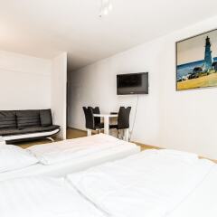 Апартаменты Apartments Deutz Кёльн сейф в номере
