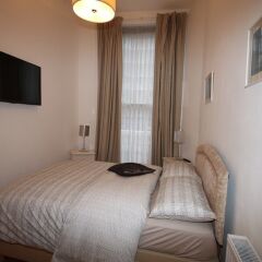 Апартаменты Belgravia Apartments - Gloucester Road комната для гостей