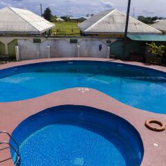Отель EEMJM Hotels and Suites Limited бассейн