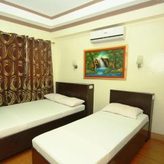 Отель Marcelina's Guest House Филиппины, Тагбиларан - отзывы, цены и фото номеров - забронировать отель Marcelina's Guest House онлайн комната для гостей фото 5