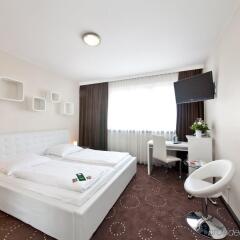 Novum Hotel Lichtburg Berlin Am Kurfurstendamm Берлин комната для гостей фото 3