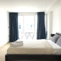 Отель UPlus Avenue Residence Паттайя комната для гостей фото 4