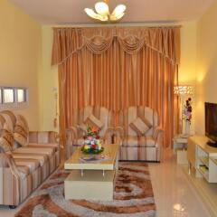 Al Shams Plaza Hotel Apartments комната для гостей