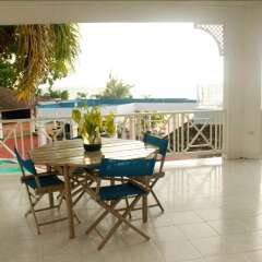 Отель Beachcomber Club Resort Ямайка, Саванна-Ла-Мар - отзывы, цены и фото номеров - забронировать отель Beachcomber Club Resort онлайн балкон