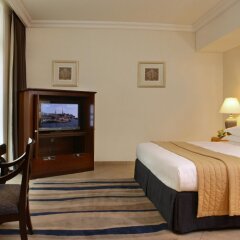 Отель Beach Rotana All Suites комната для гостей фото 5