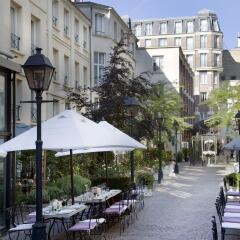 Отель Les Jardins Du Marais Париж приотельная территория