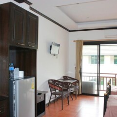 Апартаменты K&J Apartment Паттайя в номере