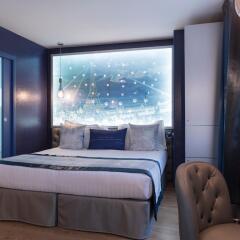 Hotel Les Bulles de Paris Париж комната для гостей