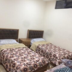 Отель Jasmine leaves furnished apartments Иордания, Амман - отзывы, цены и фото номеров - забронировать отель Jasmine leaves furnished apartments онлайн комната для гостей фото 3