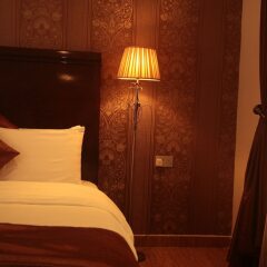 Отель Cotton Suites комната для гостей фото 5