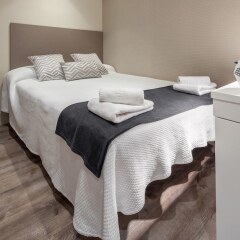 Отель Habitat Apartments Paseo de Gracia Испания, Барселона - отзывы, цены и фото номеров - забронировать отель Habitat Apartments Paseo de Gracia онлайн комната для гостей фото 3
