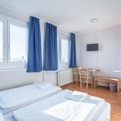 Отель a&o Dresden Hauptbahnhof 2* Стандартный номер с 2 отдельными кроватями