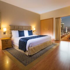 Апартаменты Crowne Plaza Dubai Apartments комната для гостей