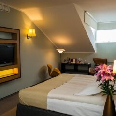 Отель Gallery Park Hotel & SPA, a Châteaux & Hôtels Collection Латвия, Рига - 1 отзыв об отеле, цены и фото номеров - забронировать отель Gallery Park Hotel & SPA, a Châteaux & Hôtels Collection онлайн комната для гостей фото 2