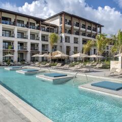 Отель Unique Club at Lopesan Costa Bávaro - All Inclusive Доминикана, Пунта Кана - отзывы, цены и фото номеров - забронировать отель Unique Club at Lopesan Costa Bávaro - All Inclusive онлайн бассейн фото 2