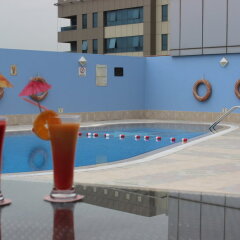Отель Grand Excelsior Hotel Sharjah ОАЭ, Шарджа - 1 отзыв об отеле, цены и фото номеров - забронировать отель Grand Excelsior Hotel Sharjah онлайн бассейн фото 2