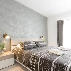 Отель Modern 3 Bedroom Near Balluta Bay Sliema Мальта, Слима - отзывы, цены и фото номеров - забронировать отель Modern 3 Bedroom Near Balluta Bay Sliema онлайн комната для гостей